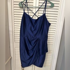 Silky cute form fitting dress.  Never worn